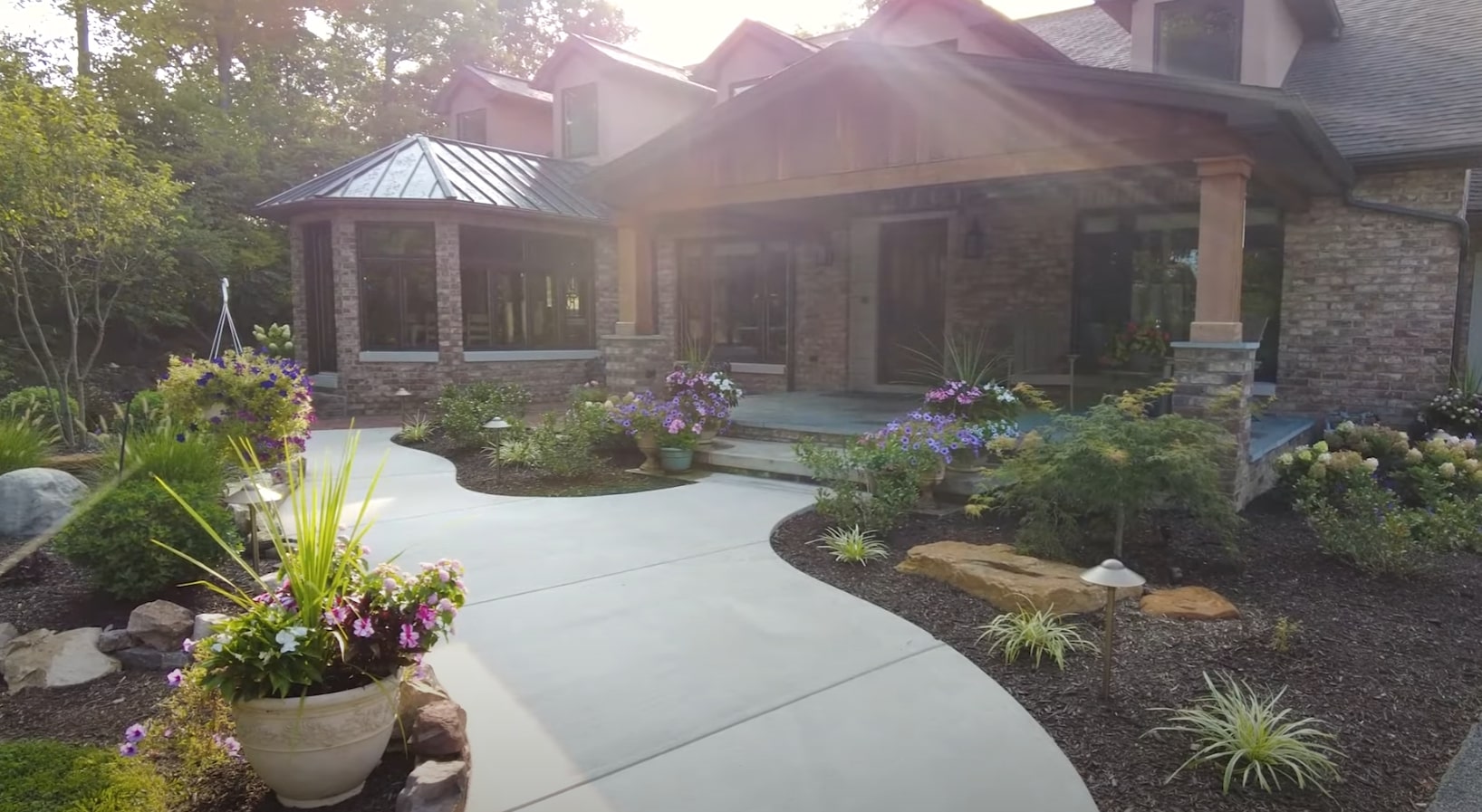 Expert Landscape Design Services - Steelgate Santa Ana Landscaping Professional landscape design featuring beautiful stone pathways and lush garden beds in Santa Ana